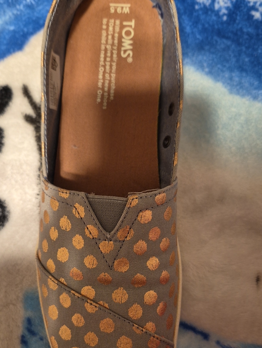 TOMS Women's Gray Slip-On with Gold Polka Dots